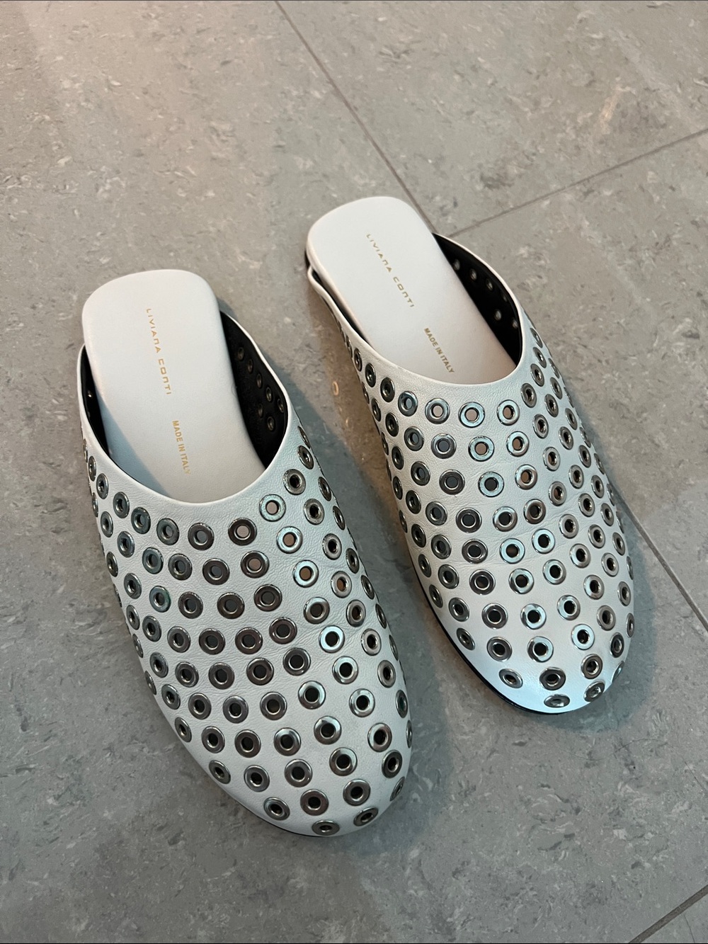 Liviana Conti silver grommets white leather mule